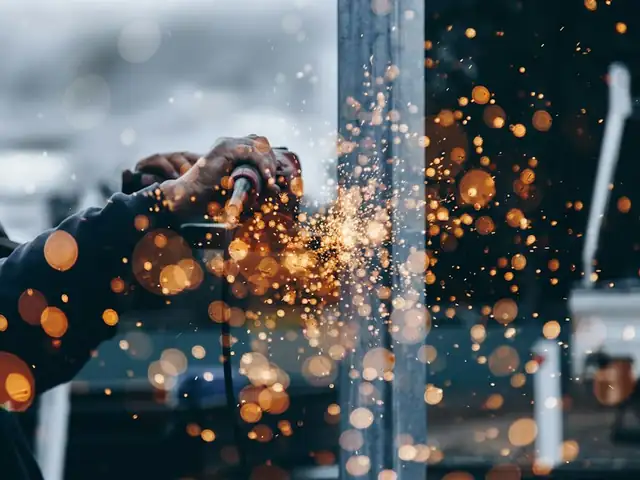 Sparks from metal grinding in a workshop