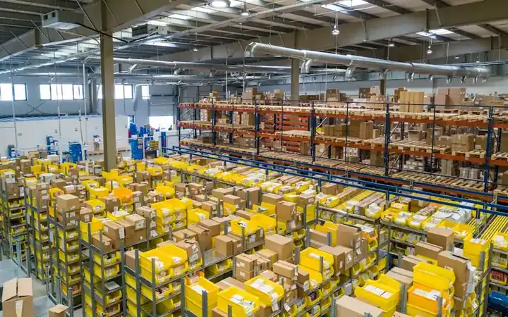 Warehouse floor with cartons being sorted and consolidated